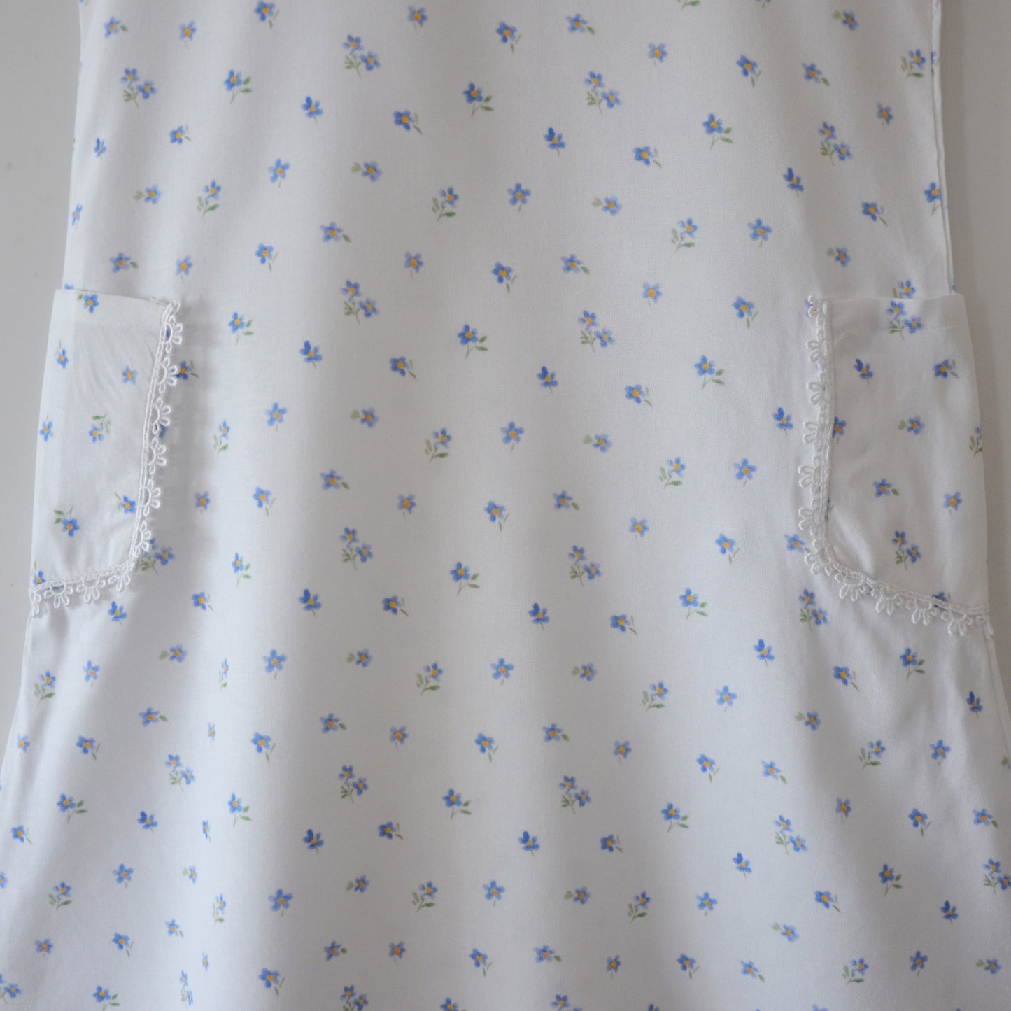 Madeline dress in blue flower print with pockets - White