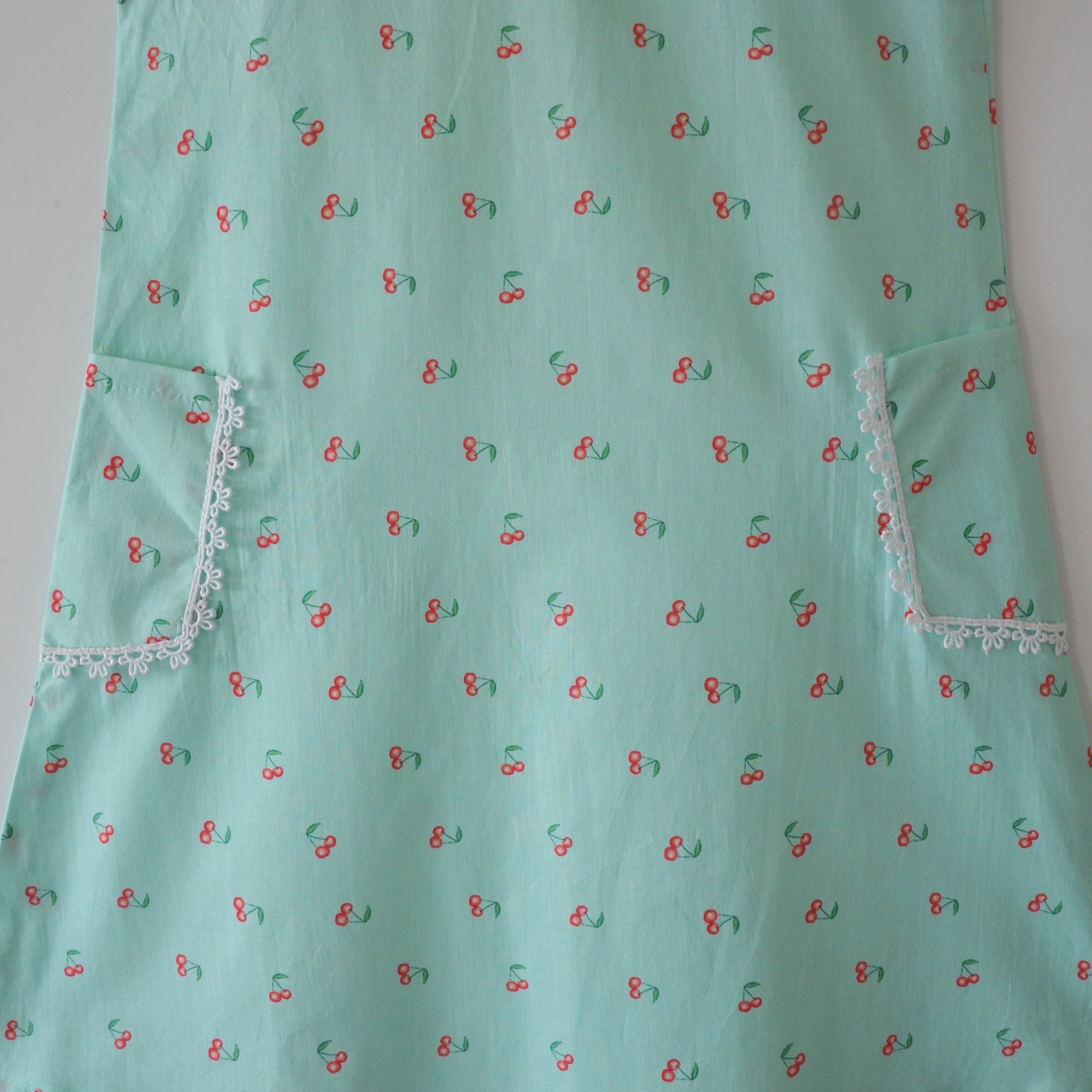 Madeline dress in cherry print with pockets - Green